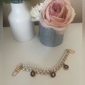 Louis Vuitton bag charm up-cycled with authentic Charms